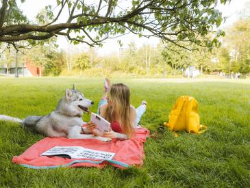 Female student, dog, college campus